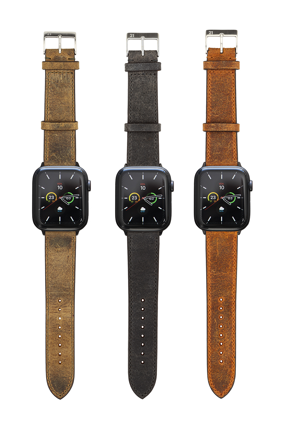Trois bracelets Apple Watch en cuir vintage posés côte à côte